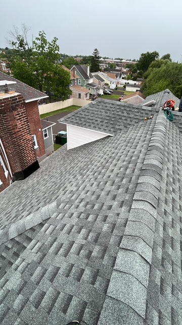 GAF asphalt shingle roof on a Doylestown, PA home with chimney