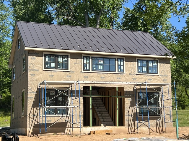 Standing seam metal roof installation on a home in Buckingham, Pennsylvania