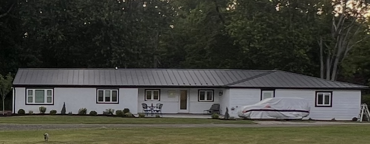 Standing seam metal roof on a home in Perkasie, PA by Franco Roofing